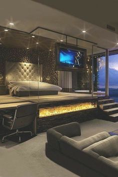 an image of a bedroom with a couch and tv in the corner, on pinterest