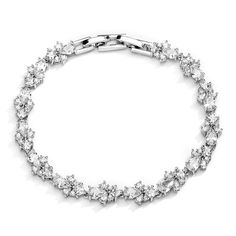 a bracelet with clear crystal stones on the sides and an oval link at the end