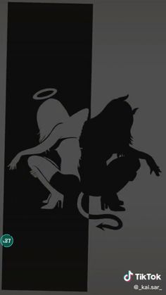 a black and white image of a monkey with an angel on it's back