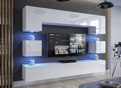 a modern living room with white furniture and blue lighting on the tv screen is illuminated by recessed lights