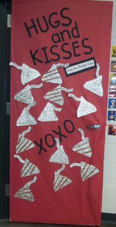 a door decorated with silver glitter hearts and words that read hugs and kisses yo yo