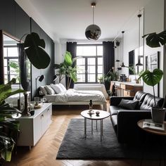 a living room filled with furniture and lots of plants