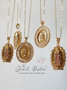 THIS ITEM SHIPS SAME OR NEXT-DAY 📦✈ Oval pendant with a depiction of Our Lady of Guadalupe The figure of the Virgin Mary wears a mantle encrusted with crimson and black crystals and scalloped edge clear crystal frame Pendant measures 40mm (1.6 inches), strung on 18" adjustable link chain Lobster clasp closure 18K gold-plate over alloy metal Clear and colored zircon diamonds Suitable as a gift for First Communion, baptism, or just because Gloria Virgin Mary Necklace + Clear Baguettes also shown Virgin Mary Necklace, Cross Earrings Studs, Black Pink Instagram, Custom Name Necklace, Cute Necklace, Scalloped Edge, Oval Pendant, Jewelry Lookbook, Religious Jewelry