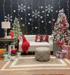 a living room decorated for christmas with presents