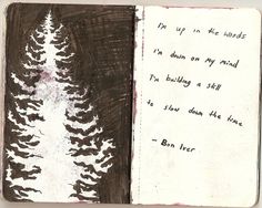 an open notebook with writing on it and a drawing of a pine tree in the background