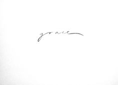 the word grace is written in cursive writing on a white sheet of paper