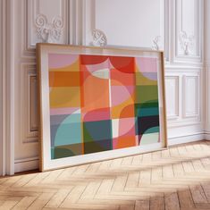 an abstract painting hangs on the wall next to a wooden floor with parquet floors