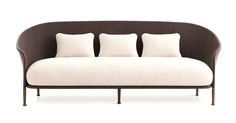 a white couch with four pillows on it's back and two sides, sitting in front of a white background