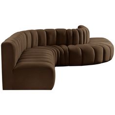 a brown couch sitting on top of a white floor