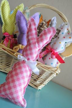 a basket filled with lots of small stuffed animals