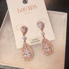 New With Tags And Box. Champagne Metal With Cubic Zirconia & Pearl Accents. Measures Just Under 2" Long And .5" At The Widest Part. Earrings Formal, Champagne Rose, Tear Drop Earrings, Champagne Color, Davids Bridal, Tear Drop, Teardrop Earrings, Bridal Jewelry, Cubic Zirconia