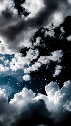 the sky is filled with stars and clouds