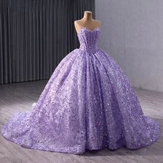 Stunning quinceañera dress in a vibrant purple hue, perfect for a 15th birthday celebration. Features a sweetheart neckline and a sleeveless design for a touch of elegance. Adorned with sparkling embellishments for added glamour and shine. Crafted with high-quality materials for a luxurious and comfortable feel. Flattering fit that enhances the feminine silhouette, creating a regal appearance. Ideal attire for young girls celebrating their quinceañera in style. Elevate the special occasion with Light Purple Quince Dresses, Moda2000 Quince Dresses, Dark Purple Quinceanera Dresses, Light Purple Quinceanera Dresses, Dresses For 15, Purple Quinceanera, Quinceanera Gowns, Quince Dresses Purple, Purple Quinceanera Dresses