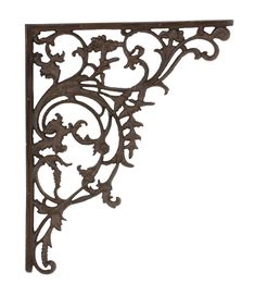 an iron shelf bracket with vines and leaves