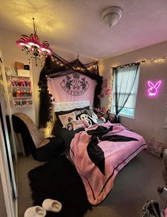 a bedroom decorated in pink and black with harry potter decorations on the walls, bedding, and rugs