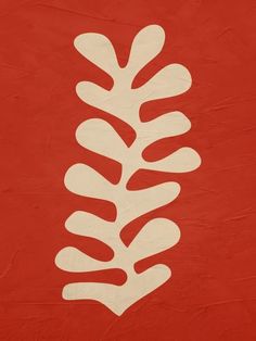 a red and white painting with an image of a plant on it's side