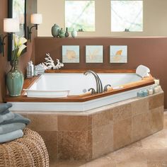 a bathroom with a large jacuzzi tub in it