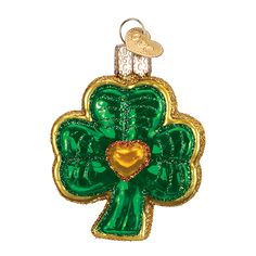 a green shamrock shaped ornament with a heart on it