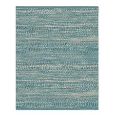 a blue and white rug with wavy lines on the bottom, in different sizes and colors