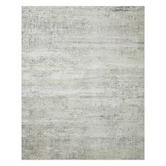 an area rug with grey and white colors