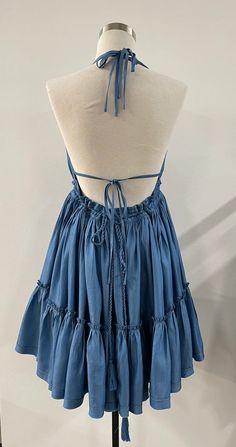 This cute dress ties on the shoulders and at the back for a sexy style. Makes it the perfect date night or special occasion dress. - Halter dress with double straps in 100% Tencel. - Adjustable in the back- Flowy- Ruffles- Ties at nape and lower back- Open back- Tiered tent skirt- High waist The Perfect Date, Perfect Date Night, Tent Dress, Special Occasion Dress, Perfect Date, Cute Dress, Tie Dress, Lower Back, Special Occasion Dresses