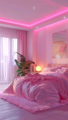 a bed with pink sheets and pillows in a room