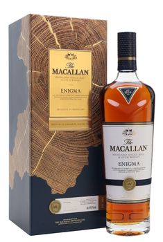 the macallan single cask whisky is in front of a wooden box and it's packaging