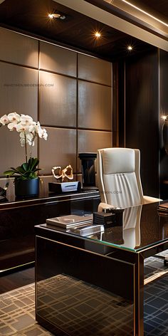 an office with a desk, chair and flowers in vases on the side table