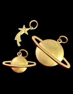 BRASS CELESTIAL CHARMS  Purchase Options: -One charm: Shooting Star, Larger or Smaller Saturn -Set of three outer space themed charms ITEM DESCRIPTION This listing is for celestial themed brass charms. There are three charms to choose from or you can purchase the full set. Charms include: tiny shooting star, larger and smaller size Saturn.  These make perfect bracelet charms or wear as a dainty necklace pendant.  These are brass metal stampings - slightly dimentional on the front and hollow on the reverse. They are made from a vintage stamp however are more recently made. Each charm is light in weight and easy to wear!  Purchase options: individual charm (one charm), or full set of all three. Please note: there is a slight discount when purchasing all three charms as a set. The charms are Saturn Planet, Bracelet Charms, Celestial Jewelry, Brass Charms, Vintage Stamps, Shooting Star, Bracelet Charm, Gift For Friend, Shooting Stars