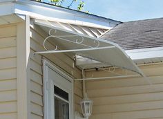 an awning on the side of a house