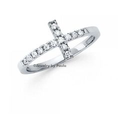 14k Solid White Gold Sideway Cross Ring A dazzling display of your faith, this 14k genuine gold statement ring is as beautiful as it is meaningful. Uniquely crafted and encrusted with 1/10 ct. t.w. manmade diamonds add something special to your every ensemble. Size 4 5 6 7 8 9 & Half Sizes Diamond total weights may vary between .01 and .08 carat. Jewelry photos are enlarged to show detail   This exquisite simulated diamond ring is crafted out of solid 14k yellow gold and brilliant man-made diamonds. This beautiful ring is one of the  newest and most desired designs of all rings. The diamond accents are set in a unique micro-pave setting. They emit every shade of light that a  natural diamond would emit. The radiance and fire of these created diamonds are equivalent if not superior to a nat Finger Band, Simulated Diamond Rings, Fancy Rings, Detailed Jewelry, Gold Statement Ring, Man Made Diamonds, Popular Jewelry, Cross Ring, Gold Stone