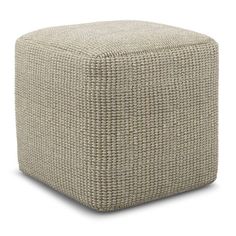 a square foot stool made out of woven fabric, with the seat upholstered