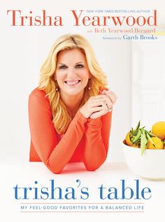 the cover of trisha's table by trisha yearwood, featuring a bowl of fruit