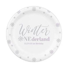 a white paper plate with blue snowflakes and the words winter nedderland on it