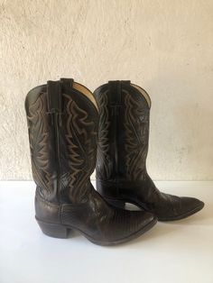 Vintage Justin dark chocolate brown reptile leather cowboy boots in beautiful condition!   Soft and pliable.  Six rows of stitching. Stacked heels.  Well cared for!  Only wear noted is on the soles.  Gorgeous! Justin Style S 8306, Registered No Y7323; Goodyear Chemigum heels Label:  Justin; Made in the USA Size:  labeled size is 8 1/2 EEE (wide).  Please check measurements for an accurate fit.  Questions are welcome! Measurements  height floor to top of tab 14 1/2 exterior length 11 5/8 heel 1 3/4 Justin Cowboy Boots, Reptile Skin, Boots Tall, Dark Chocolate Brown, Leather Cowboy Boots, Velvet Material, Western Cowboy Boots, Dark Brown Leather, Western Cowboy