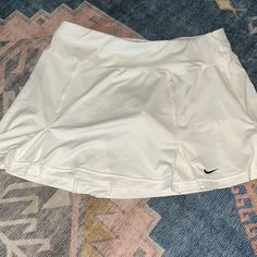 Nwot Nike Skirt With Built In Shorts Nike Casual Short Tennis Skirt, Nike Casual Tennis Skirt, Nike Skirted Bottoms For Summer, Nike Sporty White Skirt, Nike Casual Short Skirt, Nike Lined Skirt For Spring, Casual Short Nike Skirt, Nike White Casual Skort, Nike White Tennis Skirt For Spring