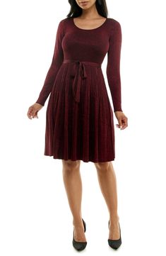 A fit-and-flare silhouette hugs your figure in a long-sleeve sweater dress with a ribbed texture and metallic shine. 39 1/2" length Scoop neck
 Long sleeves 78% rayon, 22% polyester Machine wash, tumble dry Imported Model stats: 5'10" height, 32" bust, 25" waist, 36" hip. Style Inverted Triangle, Pleat Skirt, Inverted Triangle, Daytime Dresses, Long Sleeve Sweater Dress, No Closure, Sweater Dresses, Ribbed Texture, Awesome Things