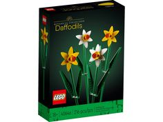 the lego box has three yellow and white daffodils in it's packaging