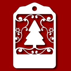 a paper cut christmas tree on a red background