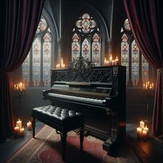 a grand piano sitting in front of a stained glass window with candles on the floor