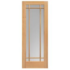 a wooden door with glass panels on the top and bottom panel, in light wood