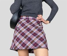 Vintage y2k 00s Esprit Warm Checkered Skirt CONDITION: Excellent Vintage Condition FABRIC: label is missing, feels like wool blend SIZE: UK12/L; EU40 Seen on a model size S/8; 5'11 Skirt is clipped at the back to fit models waist FLAT LAY MEASURES: /Waist 16.5in /Hips 20in /Length 15in POSTING from Lithuania with trackable priority shipping Any questions, please message :) Y2k Style Winter Mini Skirt, Y2k Style Mini Skirt For Winter, Y2k Mini Skort For Fall, Y2k Mini Skirt For Winter, Winter Y2k Style Mini Skirt, Trendy Plaid Skort For Fall, Y2k Style Mini Skirt For Fall, Y2k Mini Skirt For Fall, Y2k Fall Mini Skirt