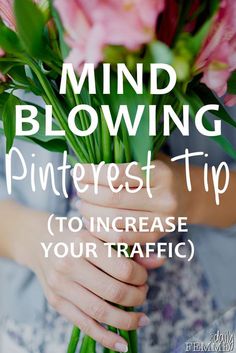 a woman holding flowers with the words mind blowing pinterest tip to increase your traffic