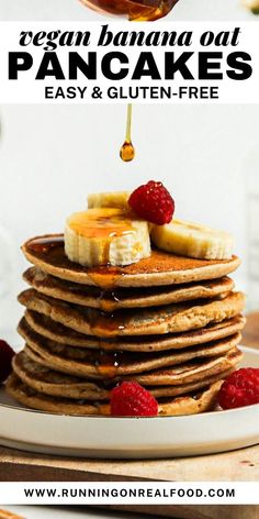 pancakes stacked on top of each other with syrup being drizzled over them