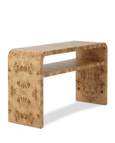 a wooden table with a shelf on the top and an animal print pattern on it