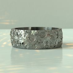 Embrace the cosmos with our Celestial Sterling Silver Ring. This unisex, artisan-crafted band features a unique hammered texture, perfect as a thumb ring or any finger jewelry.  Made with care over 5 days, with a quick 7-day delivery.  Add a touch of handmade elegance to your collection today! Our Sterling Silver Celestial Ring is the perfect blend of rustic charm and celestial elegance.  Crafted from high-quality 925 sterling silver, this textured ring features an intricate celestial design, ma Silver Jewelry Cleaner, Finger Jewelry, Celestial Design, Rustic Ring, Celestial Ring, Rustic Rings, Silver Signet Ring, Thumb Ring, Textured Ring