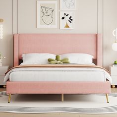 a bed with pink upholstered headboard and foot board in a white bedroom