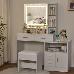 a bedroom with a vanity, stool and mirror