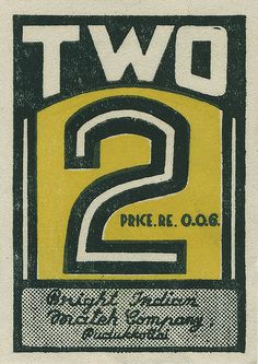 an old ticket for two shows the number 2 in black and yellow with white lettering