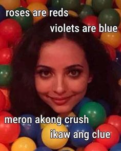 a woman in a ball pit with the caption roses are reds violets are blue meron akong crush ikeaw angg clue